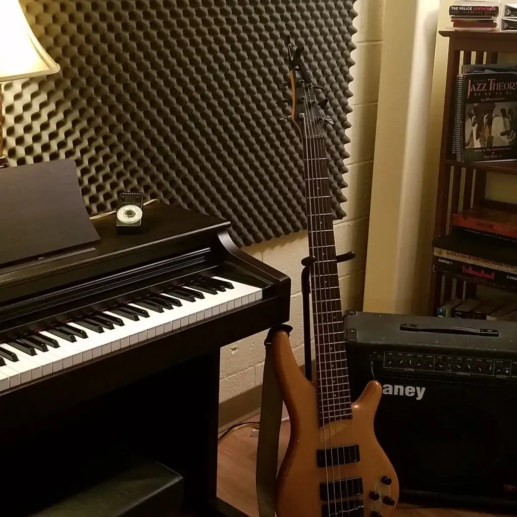 Piano and bass guitar in lesson room